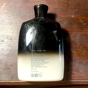 Empty Oribe Shampoo Bottle